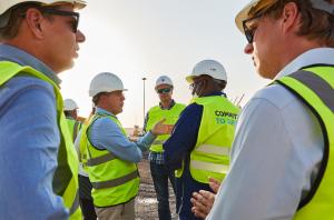 Roger Clasquin (centre left) talking with delegates during the tour of Saqr Port