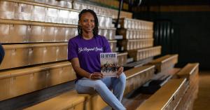 Motlow State Head Coach Kezia Conyers holding her two books