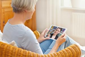 older adult using teletherapy service