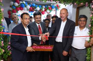 Dr. Hemant Koshia and Rolf Benz cutting the Ribbon