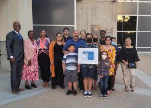 Chase Calvillo and family joined by Lampkin Foundation staff and volunteers