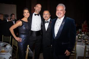 (L-R) Anchor of CNN Newsroom Ana Cabrera with husband Benjamin Nielsen, President of the Latino Commission on AIDS Guillermo Chacon, and SOMOS U.S. Co-Founder Henry R. Muñoz III.