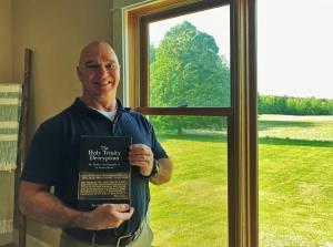 Author with his book