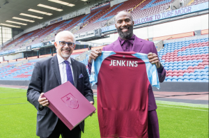 Malcolm Jenkins poses with the Burnley F.C. Chairman Alan Pace.
