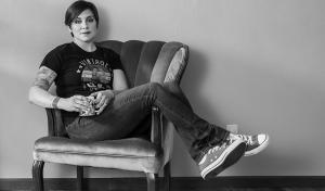 Woman on couch founder Mavens of Manufacturing