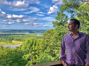 Matthew Keezer Overlooking a mountain in Arkansas