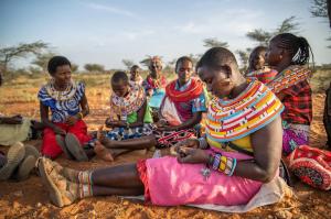 The ladies of the beadWORKS artisan group in rural northern Kenya, making tribal jewellery and unique gifts for sale at NOVICA.com.