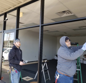 Installation of glass at a commercial store front in Gretna, LA
