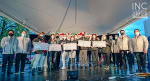 Representatives from the Lookout shelters receive the cheque donations and care packages from the Church Of Christ.