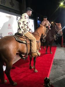 Zarian Hadley and Thomas Lockhart with the horses from the short film "Clap"