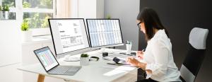 woman running accounting numbers on her computer
