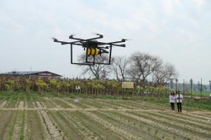 Students of Lovely Professional University using the Flying Farmer drone for field surveillance