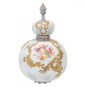 Art glass covered jar marked “Crown Milano 572”,11 inches tall, in blue and white tones with a colorful rose floral décor.