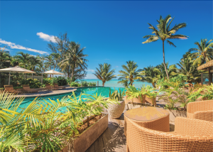The pool and lagoon at Nautilus Resort in the Cook Islands, a StashHotel Rewards partner.