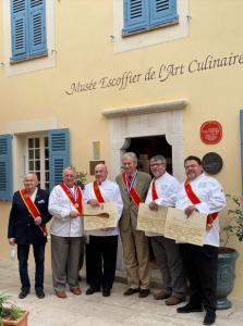 Photo of Kaminski and Alexander after induction into DISCIPLES ESCOFFIER INTERNATIONAL