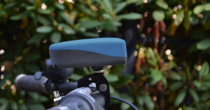 The blue SODAQ AIR is a portable air quality monitor that measures the air wherever you are.