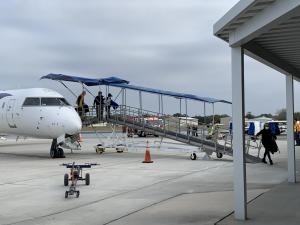 Passengers arriving from Newark on Elite Airways at St. Augustine NFRA