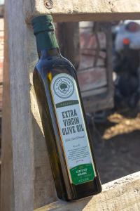 In this picture,  there is Artem Oliva Certified Organic Extra Virgin Olive Oil in Marasca Type Bottle