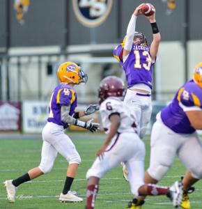 Denham Springs High School Player Catching Ball in Mid-air