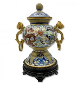 One of a kind - A large Chinese cloisonné jar/urn – a highly decorative piece with dragons, intricate scrolls and dragon handles on a carved wooden base