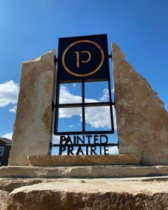image of painted prairie entrance signage