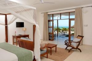 <img src="KisiwaHouse.png" alt="Kisiwa House Bahari Beach Front Villa">