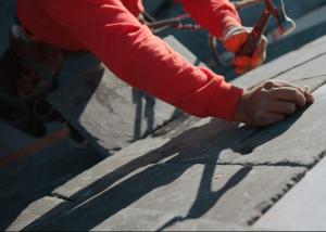 Guy Roofing installs a high-end slate roof.