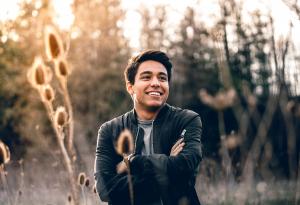 young man in field