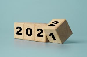 Flipping of wooden cube block for change 2021 to 2022