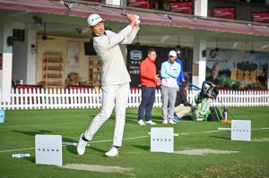 Chinese male golfer Haotong Li hitting a golf ball during practice for the Volvo China Open