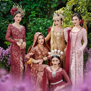 Models wearing kebaya design by Devina Shanti