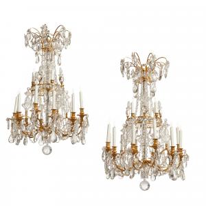 20th century Louis XVI style gilt bronze, cut and molded clear glass sixteen light chandeliers ($23,750).