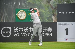 Chinese male golfer Yanwei Liu playing a tee shot at the Volvo China Open
