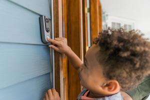 Boy Ringing ADT Video Doorbell