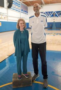 BetterTogether.Health founder, Rhoda Weiss standing with NBA all time leading scorer Kareem Abdul-Jabbar