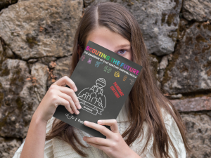 An image of a youth holding the Handbook of 21st Century Survival Skills.