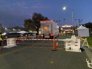 Trucks entering the Rose Bowl through Meridian Beam Gates