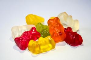 What happens if you eat too many vitamin gummies. An assortment of colorful gummy vitamins