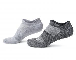 Two sustainable socks made from Repreve, one charcoal and one light gray, side-by-side with a white background