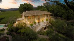 REALM's members list highly sought after luxury homes like this Wine Country home featuring indoor-outdoor living with spacious patios, vineyards and pools.