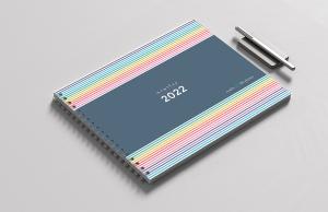 A planner created for ADHD brains to manage priorities.  A cover with colourful dots.