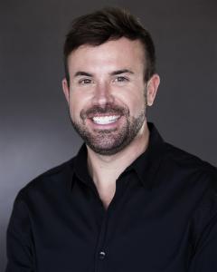 Justin Dyar, a real estate agent at Lake Homes Realty, set a record year in 2021. www.lakehomes.com.