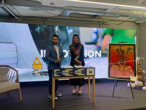 Vin Menon, Advisor, ICOA. and Martha Sáenz signing the MOU agreement.