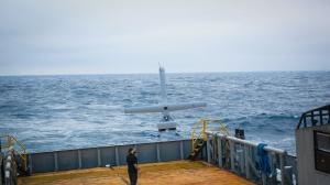 A Shield AI engineer watches as a V-BAT unmanned aircraft is launched from the deck of a small vessel during sea trials conducted on behalf of the Canadian Coast Guard.