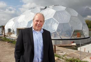 J. W. Roël in front of the Rotterdam Floating Pavilion during its construction.