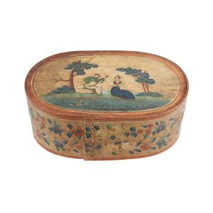 Late 18th century Pennsylvania bride’s box, of pegged construction, a large oval band box with stitched joints and nice painted surface (estimate: CA$2,500-$3,500).