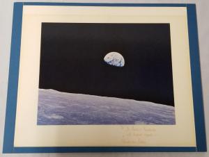 NASA photo signed and inscribed by German-born American engineer Dr. Wernher Von Braun, showing a view from Earth from the Apollo 8 spacecraft ($14,400).
