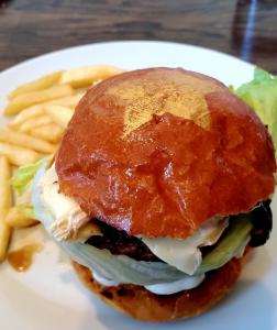 The Amazing Foie Gras Gold Dust Star Burger Created by Chef Sharon Van Meter. Availabe for a limited time at Beckley 1115.For Food In Fashion Is The Bomb