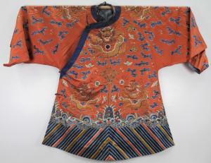 Chinese sild gold thread dragon robe dating to the Qing Dynasty (1644-1912), a beautiful early robe of high quality, 29 inches long (estimate: $2,000-$3,000).