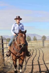 Julia Connell riding in Pierce, AZ while visiting for training early 2022